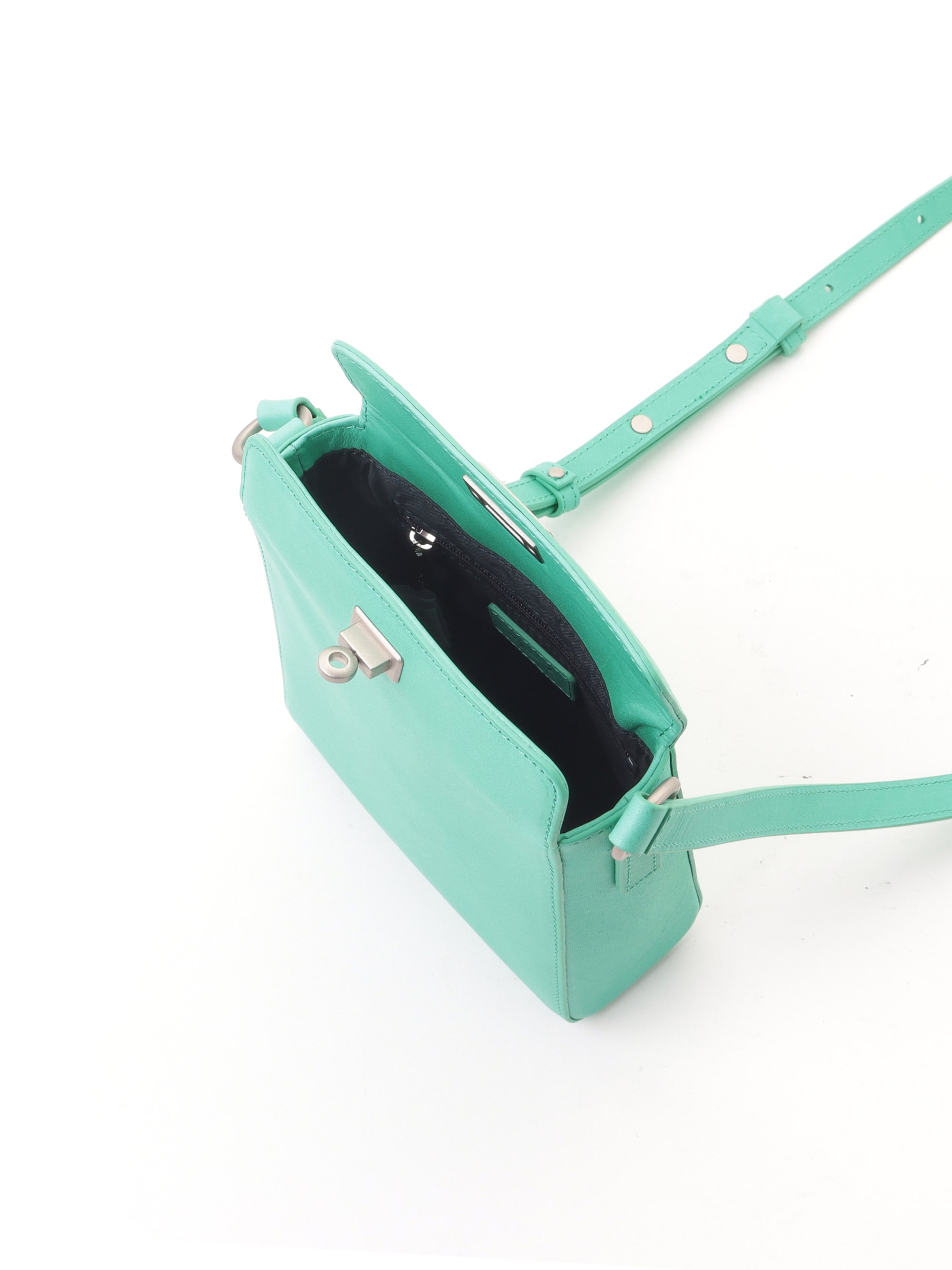 light green leather shoulder bag with twist-lock fastener