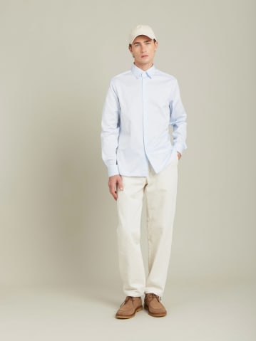 light blue Tom shirt