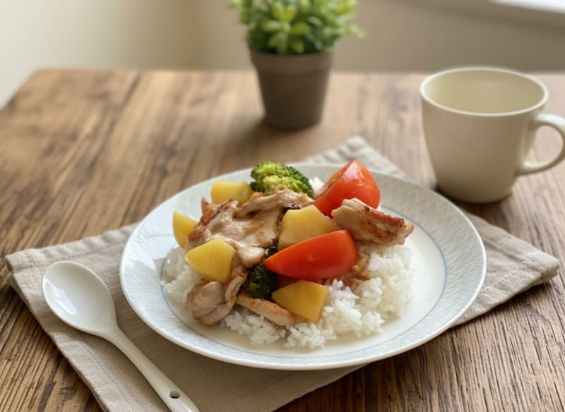 Sweet and sour chicken with pineapple, tomato and broccoli rice — tasty supper ready in minutes