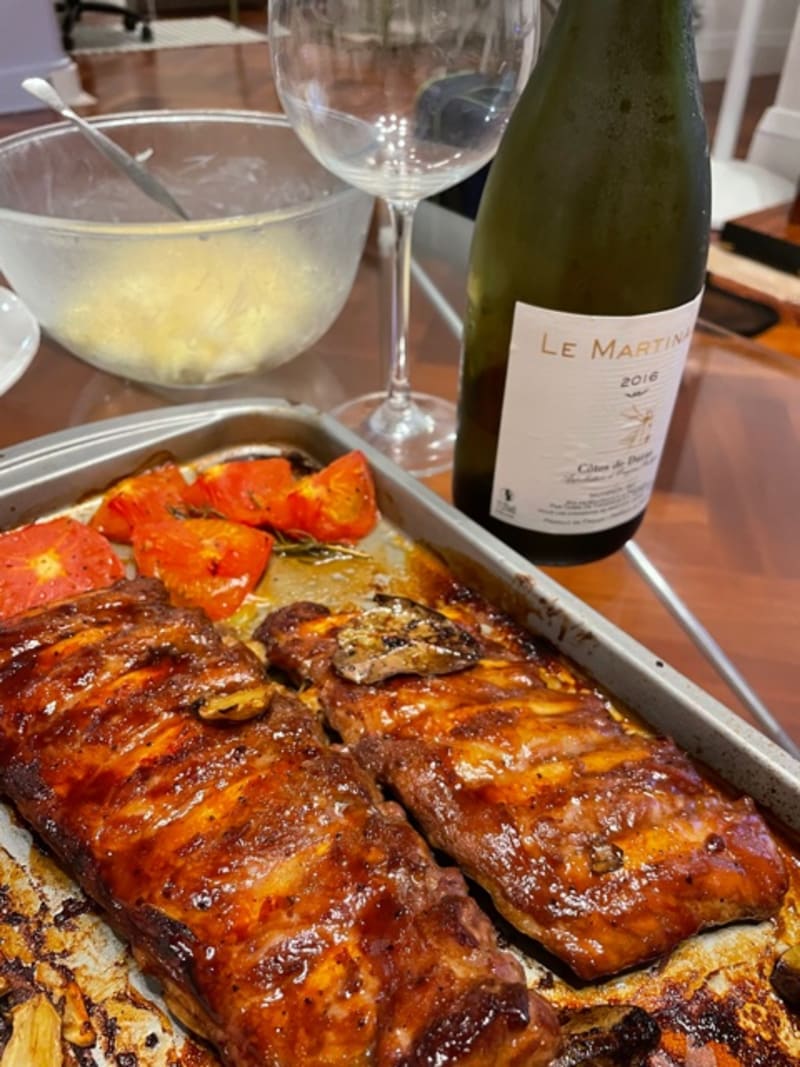 Slow-roasted glazed tender ribs on baking tray — premium Hong Kong food