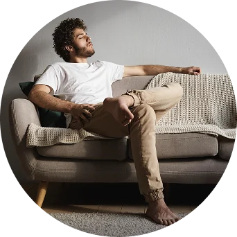 Man relaxing on a sofa