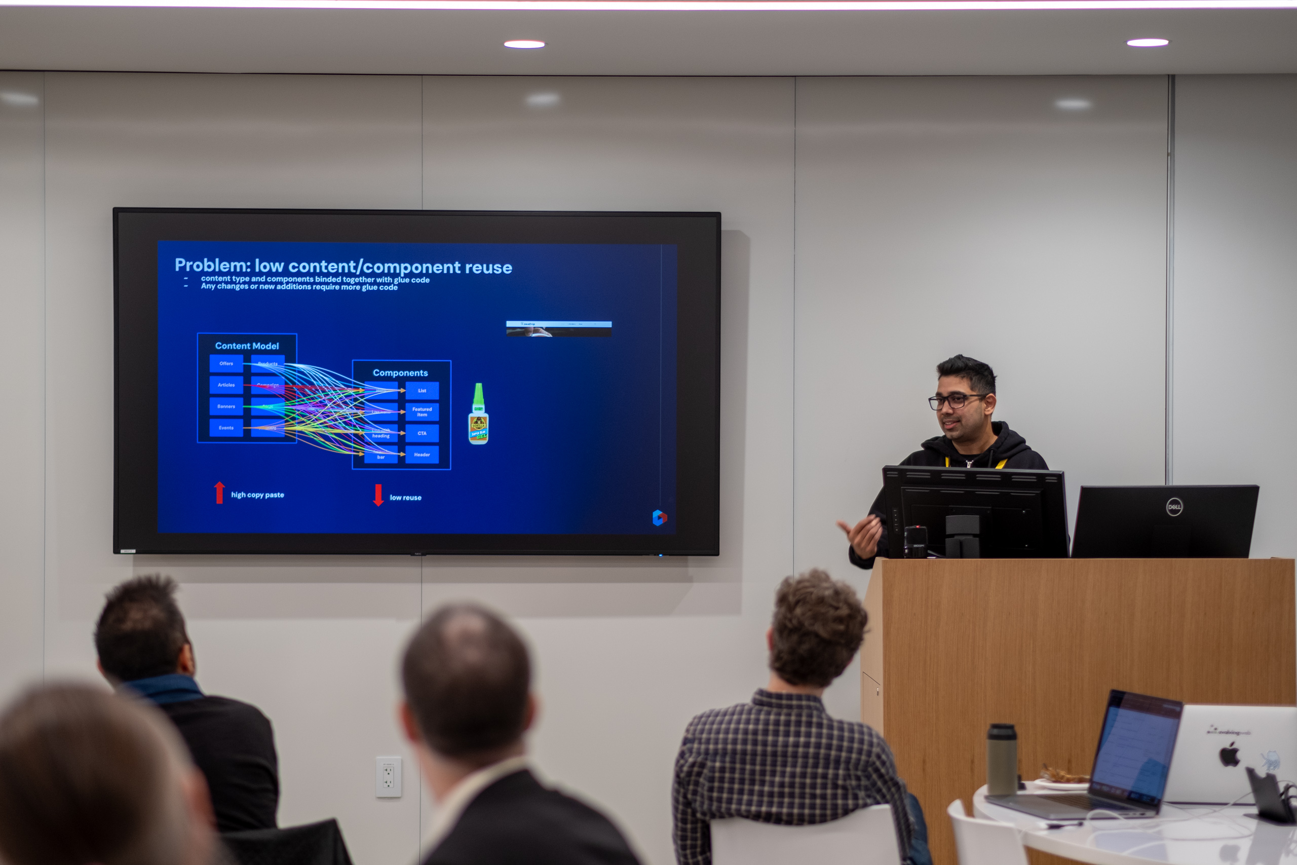 Andrew Kumar presenting at Evolve Drupal about the pains associated with binding front end and content models.