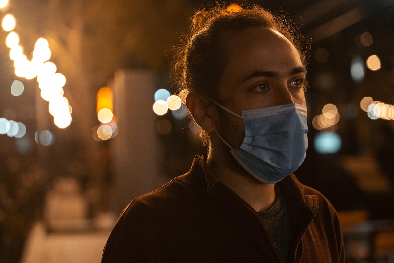 What diseases can be prevented by wearing a surgical face mask?