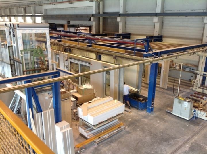 Walls on a hanging conveyor belt.