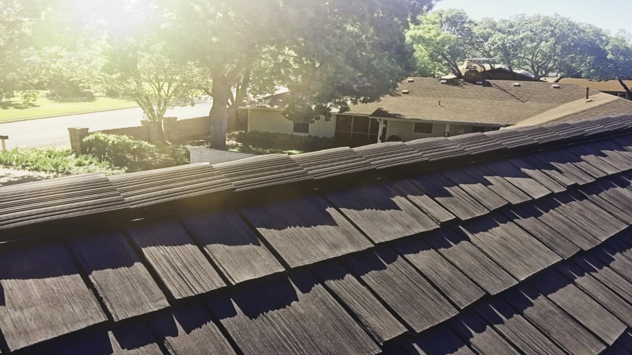Ceramic roof that looks like wooden shake during sunrise in Fort Worth, Texas