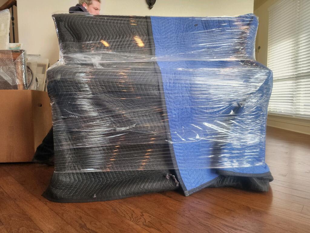 Furniture blenks and saran wrap are in order for this Fort Worth Mover