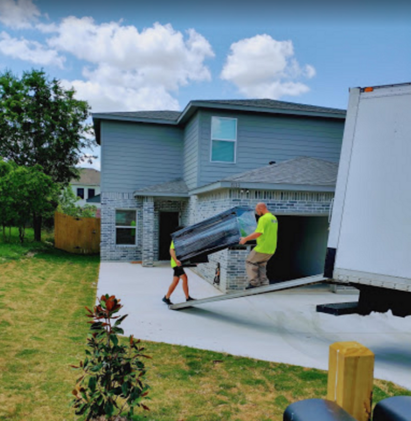 Professional movers moving furniture