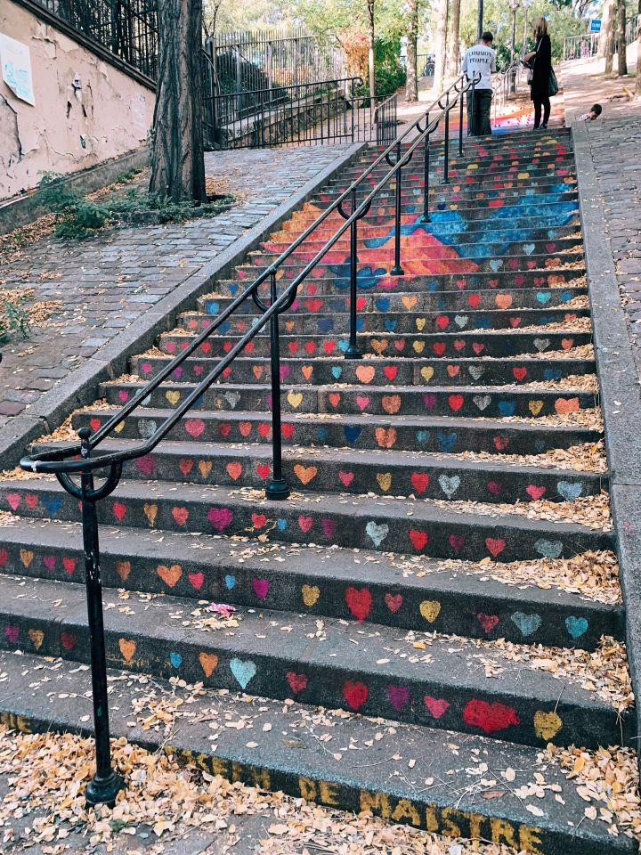 The stairs of Montmartre with each step decorated as a fresco when viewed from the bottom