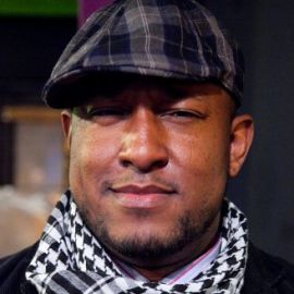 Elon James White Headshot