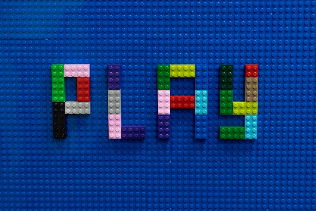 The word PLAY made with Lego bricks
