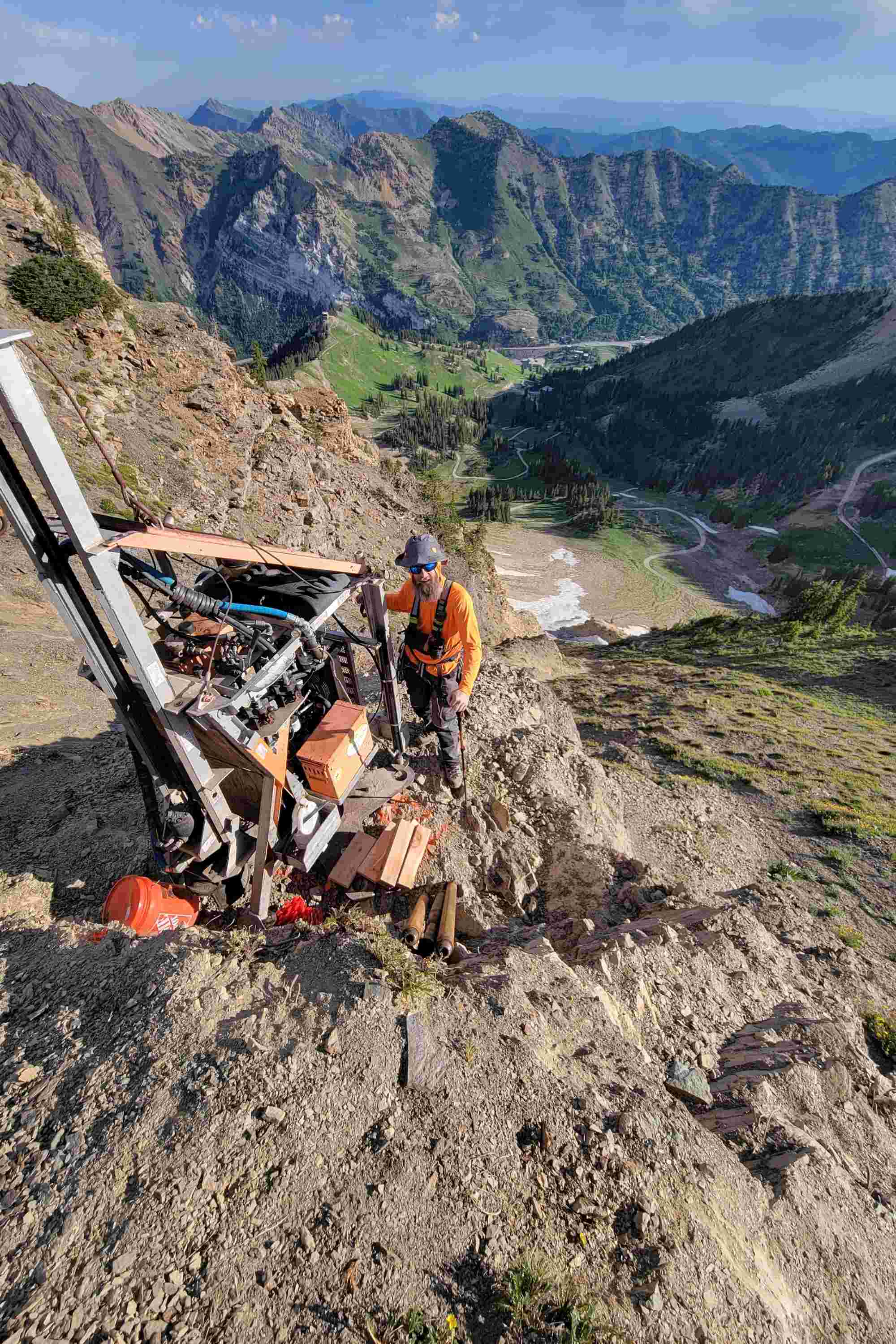 A contractor works to install a Wyssen tower platform on Mount Baldy