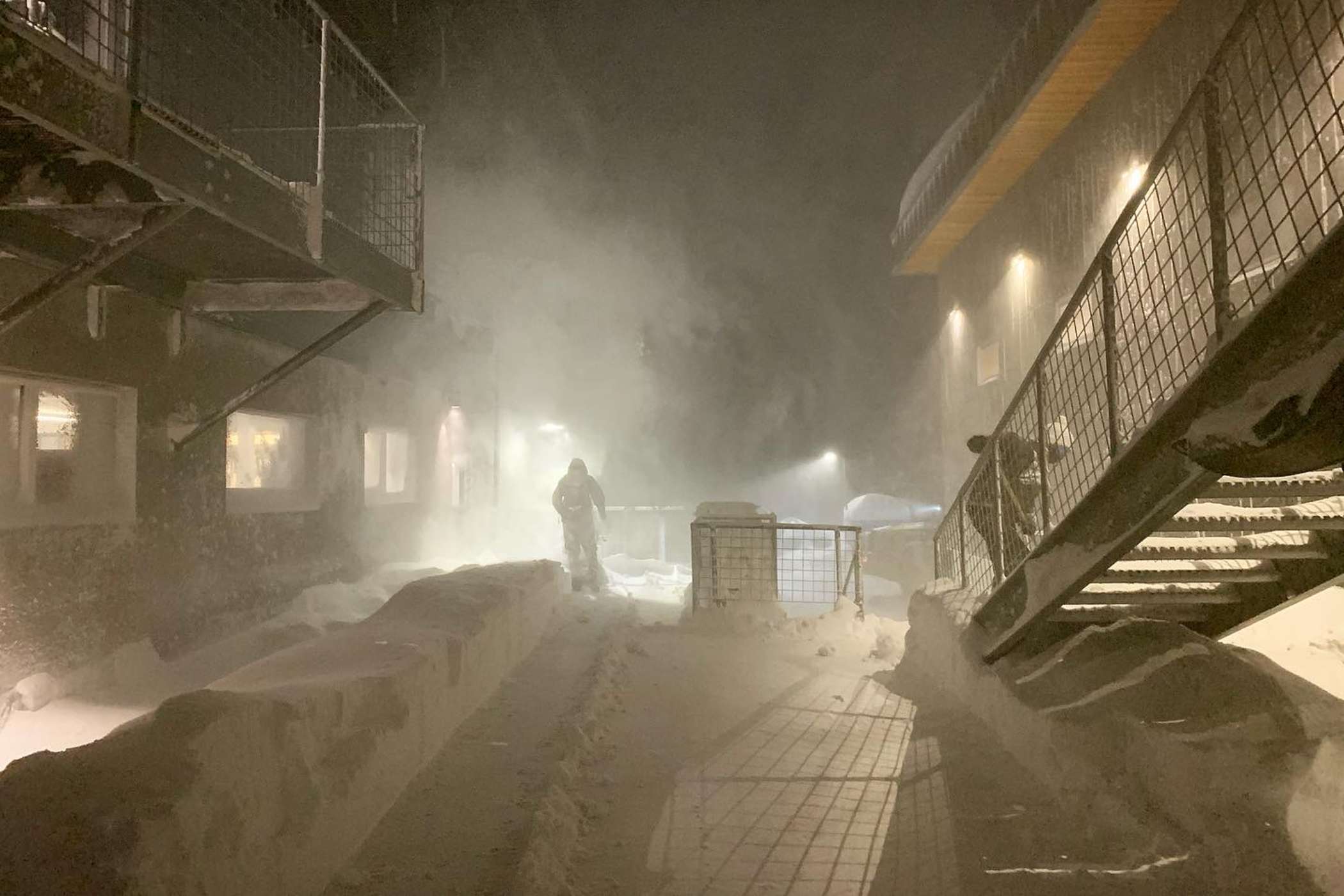 Alta employees clear snow from the Buckhorn building