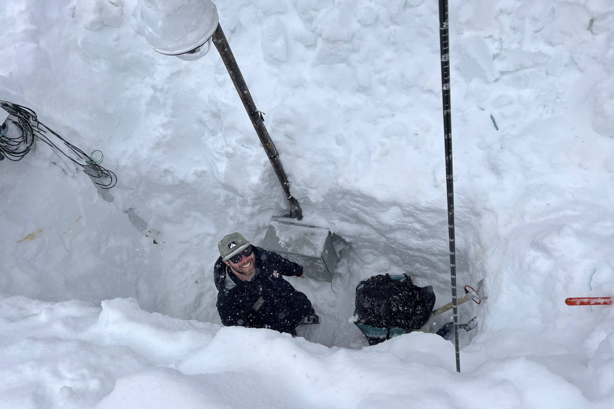 January 18th: Ted Battesh digs out the Collins snow stake cam | Photo: Jonathan Morgan