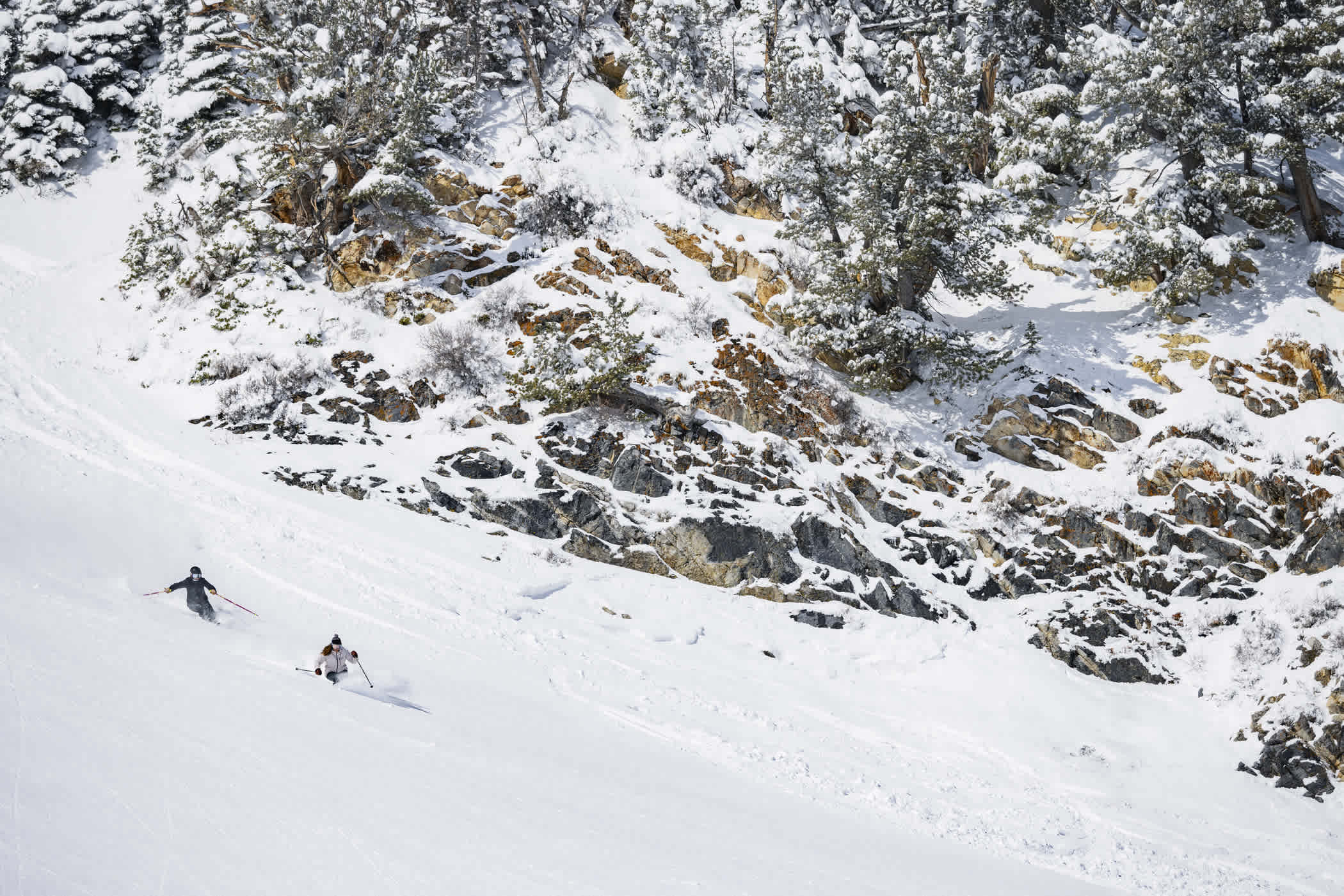 April 3rd: Sarah Kaye and Kristin Beard put down powder 8s on the Backside | Photo: Rocko Menzyk