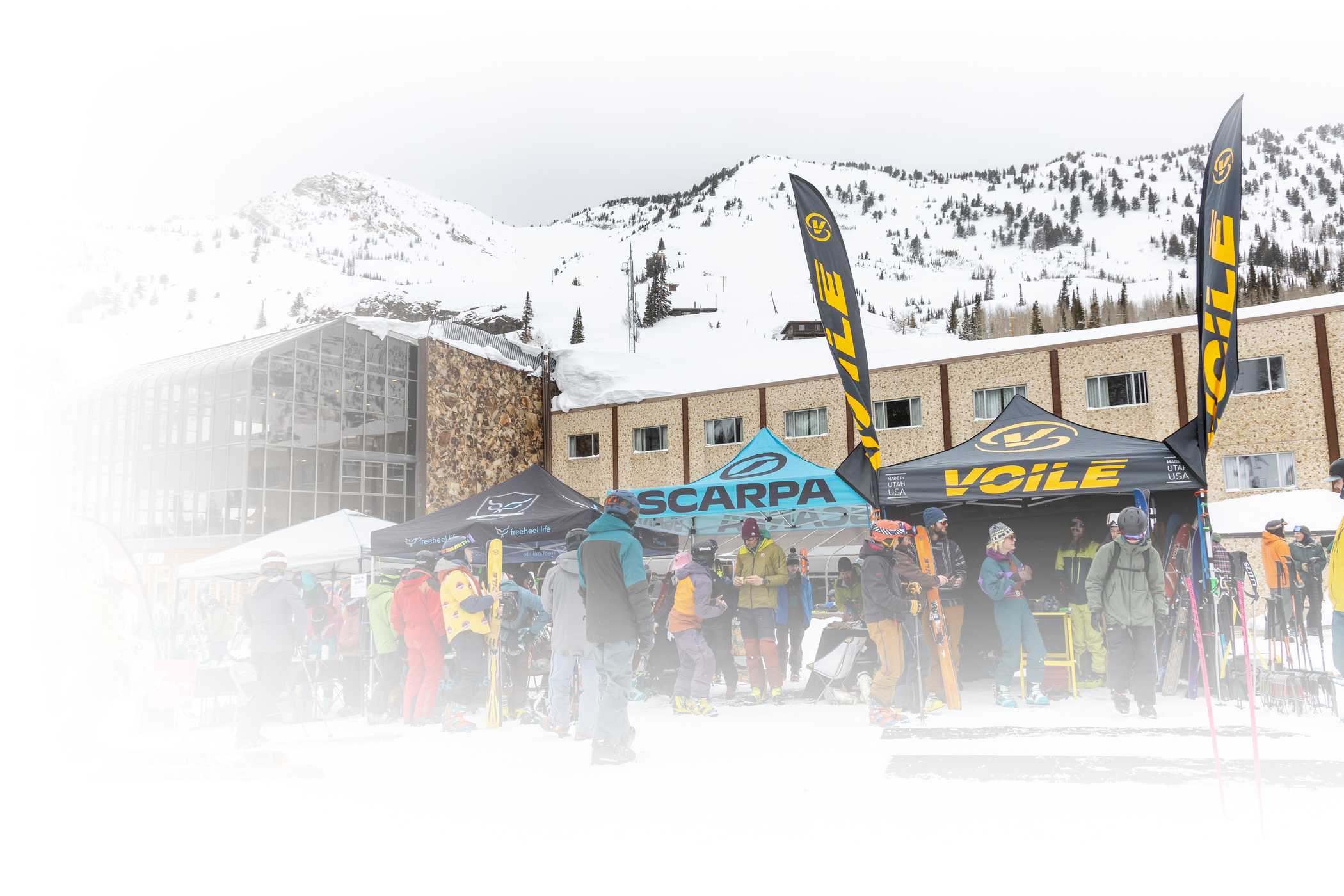 Skiers stand in the snow on World Telemark Day 2024 at Alta Ski Area