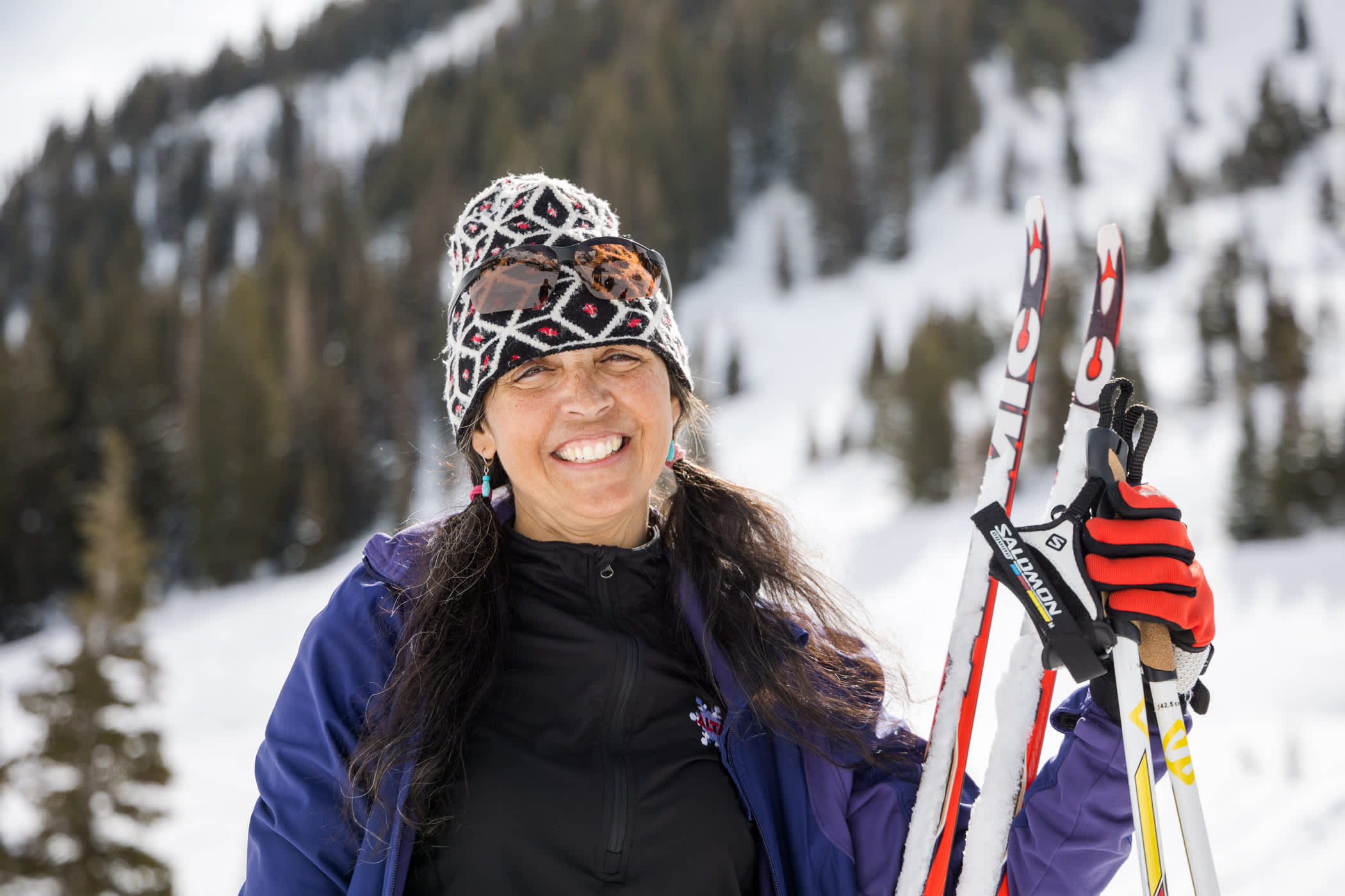 Mel Tatton enjoys her ski break on a sunny winter day at Alta Ski Area