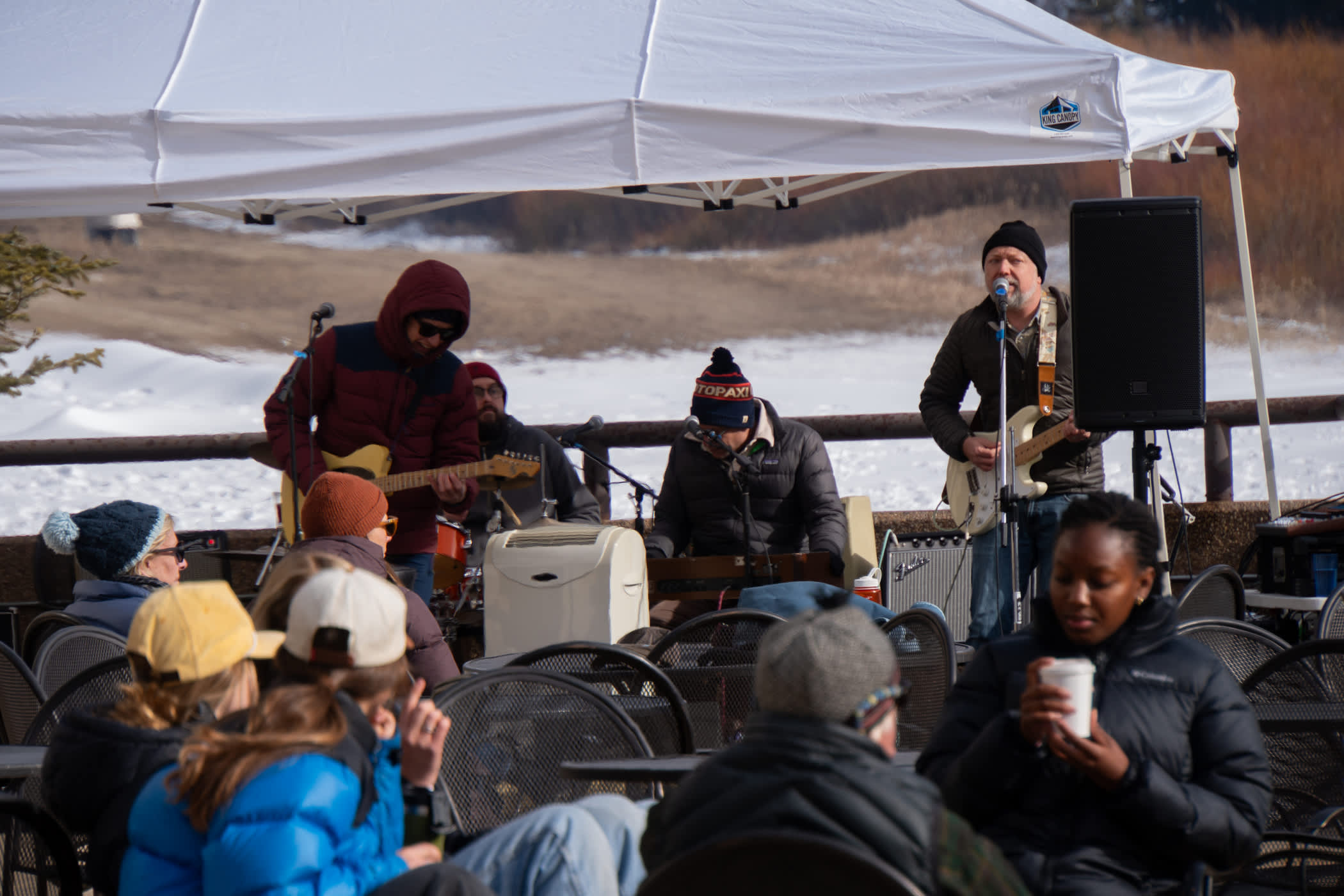 Live music on the Slopeside Cafe patio with 7th Street Strangers