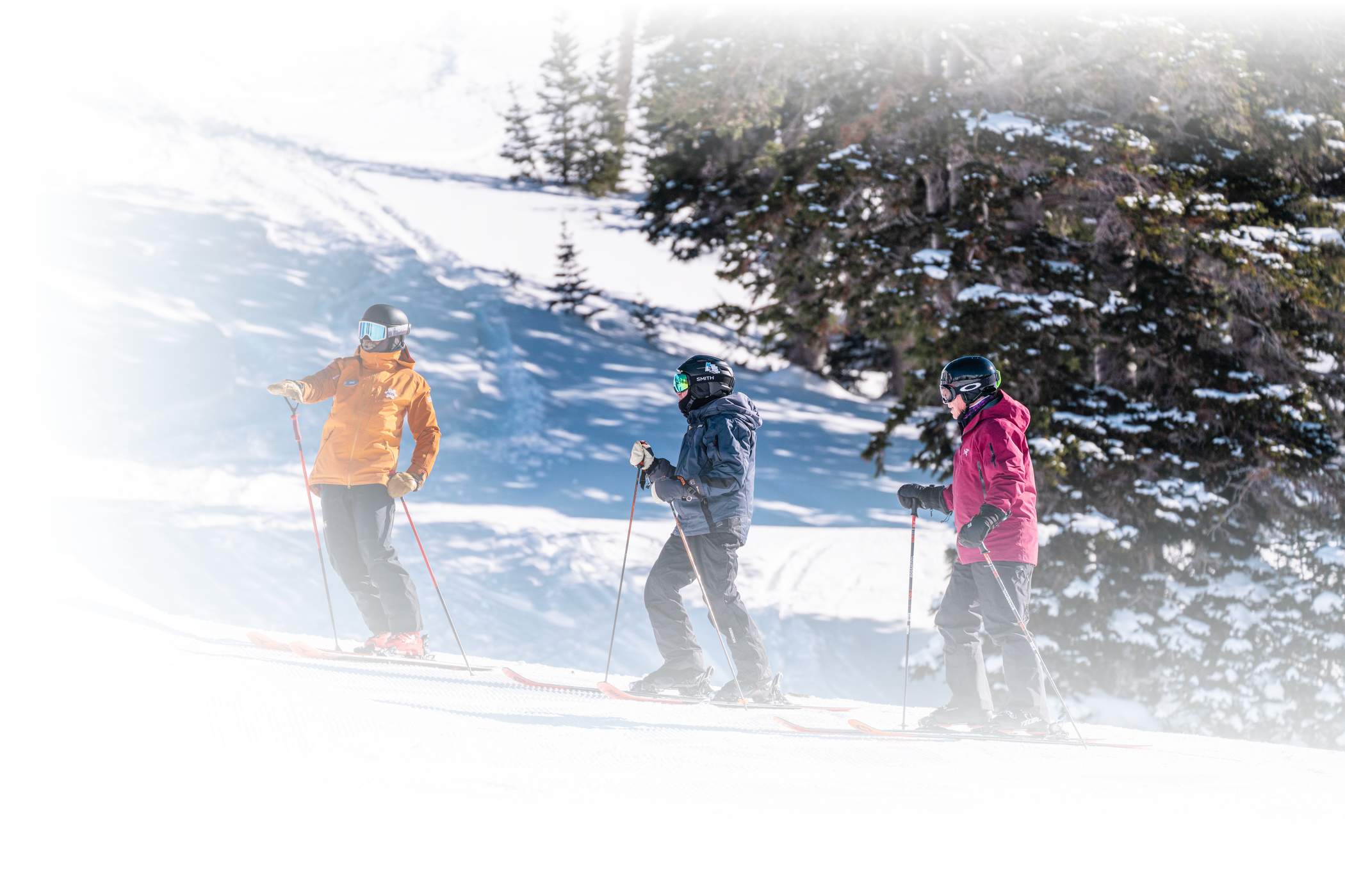 Senior skiers enjoy a lesson with Alf Engen Ski School