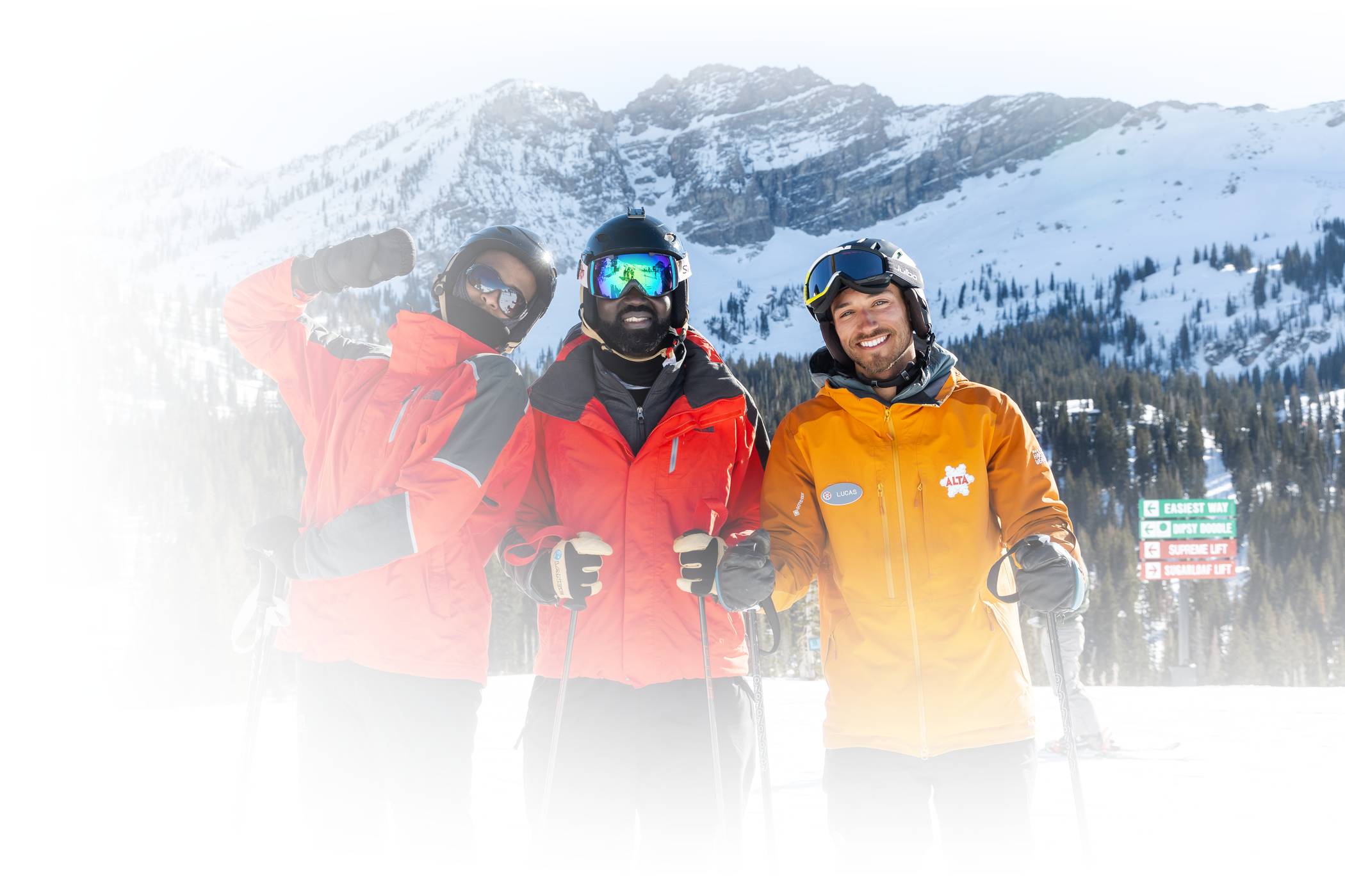 Alta skiers smile on a sunny winter day at Alta Ski Area