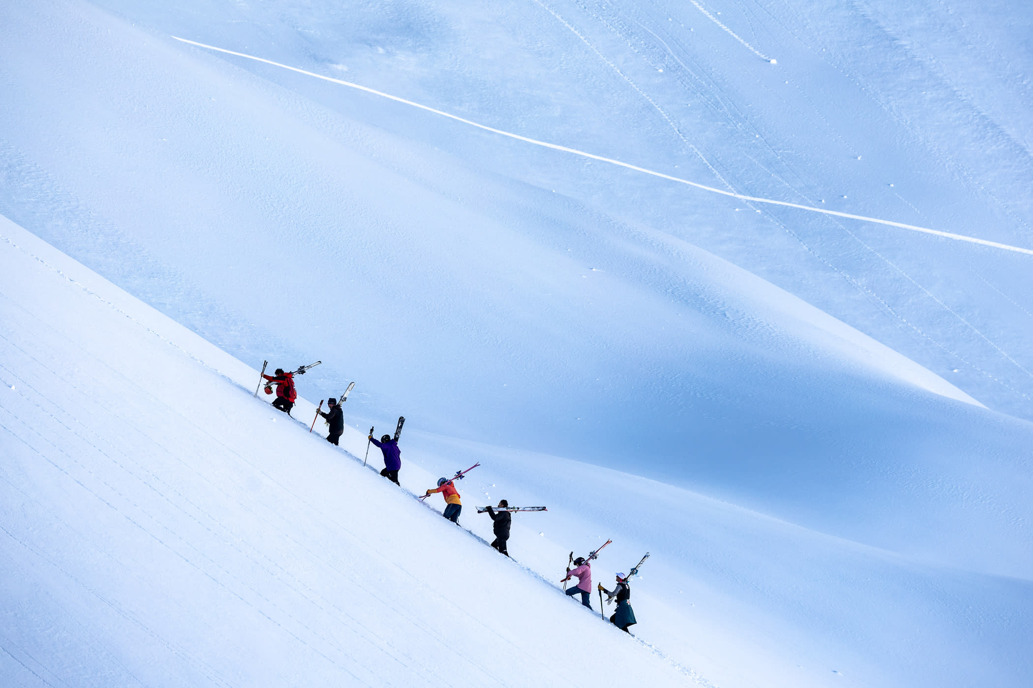 March 8th: Skiers hike the Devil's Castle apron bootpack | Photo: Photo-John