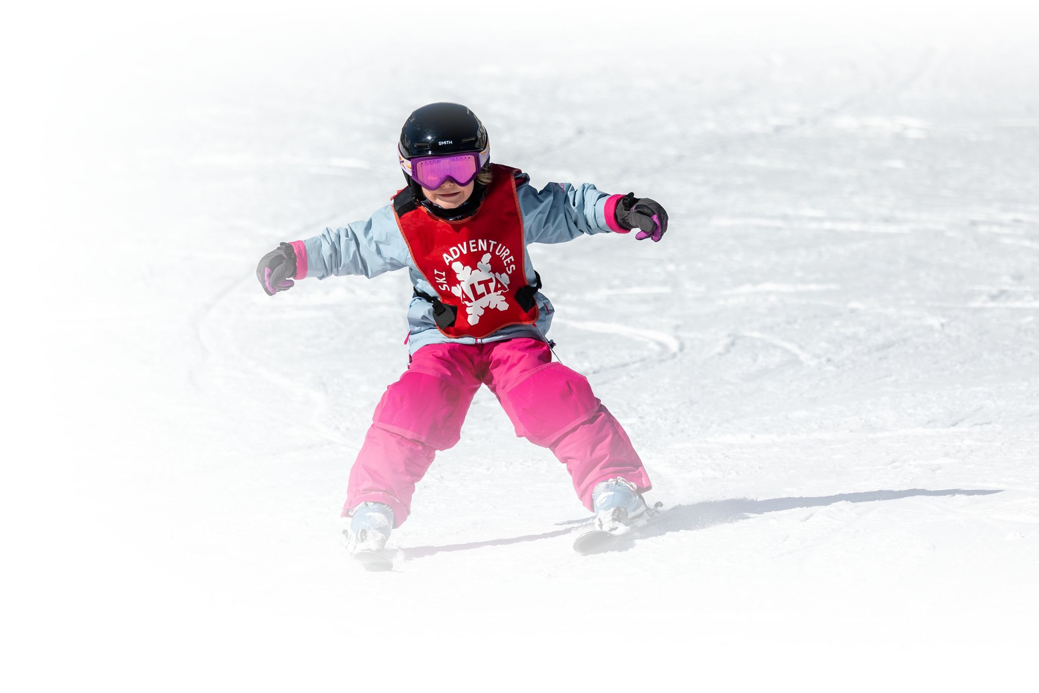 Beginner Ski Adventure skiers learn to ski via the magic carpet at alta ski area