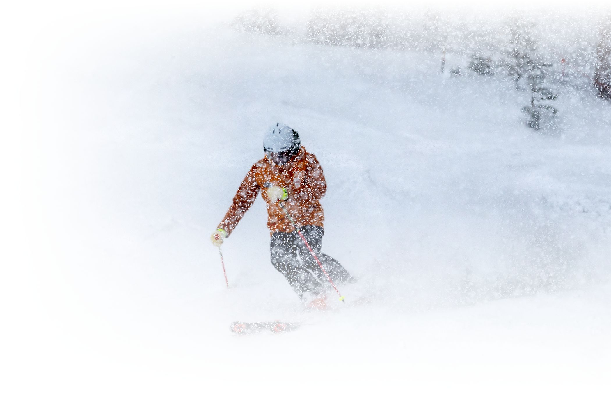 An Alf Engen Ski School instructor skis really deep powder
