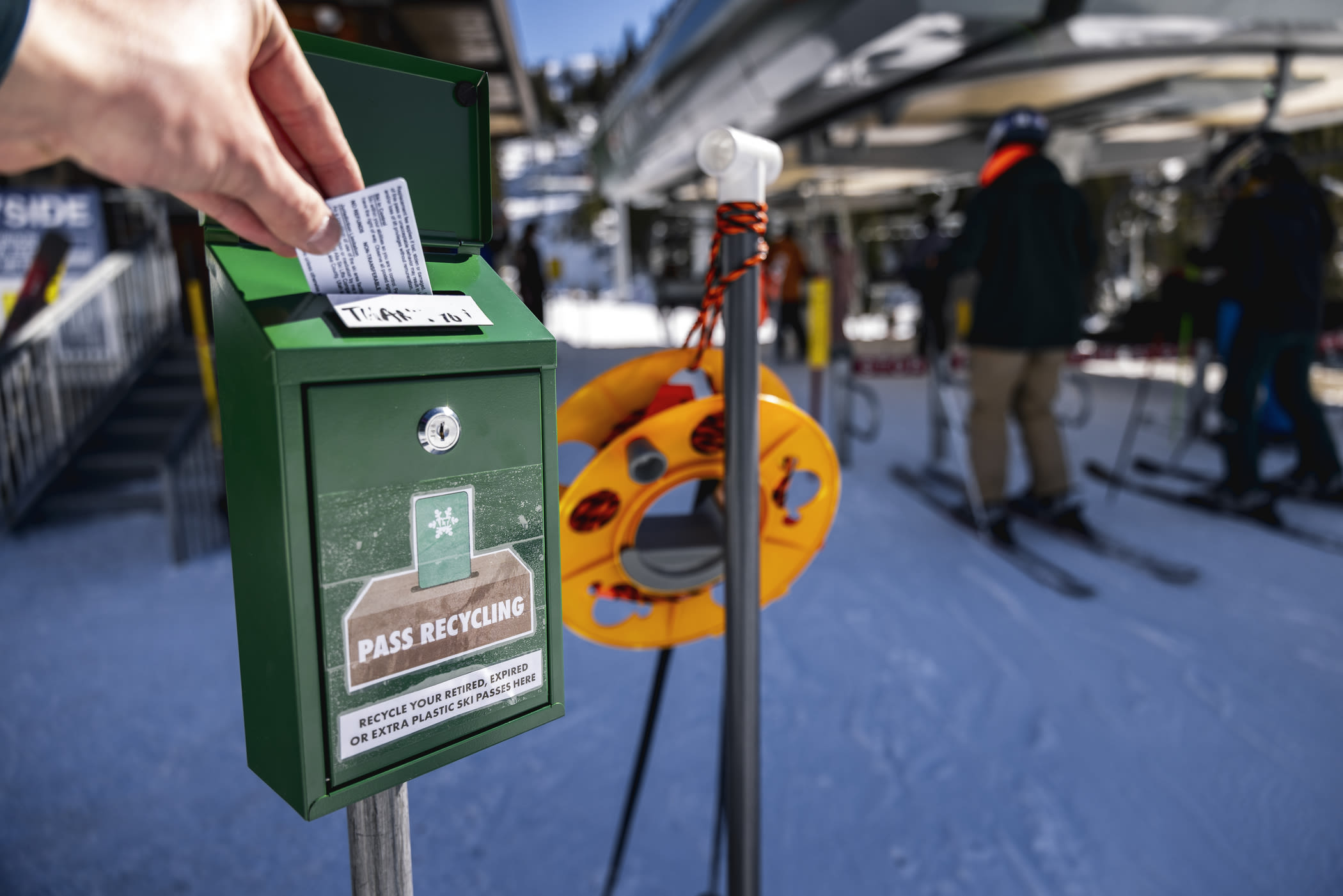 Green pass recycling box at the base of the Collins lift 
