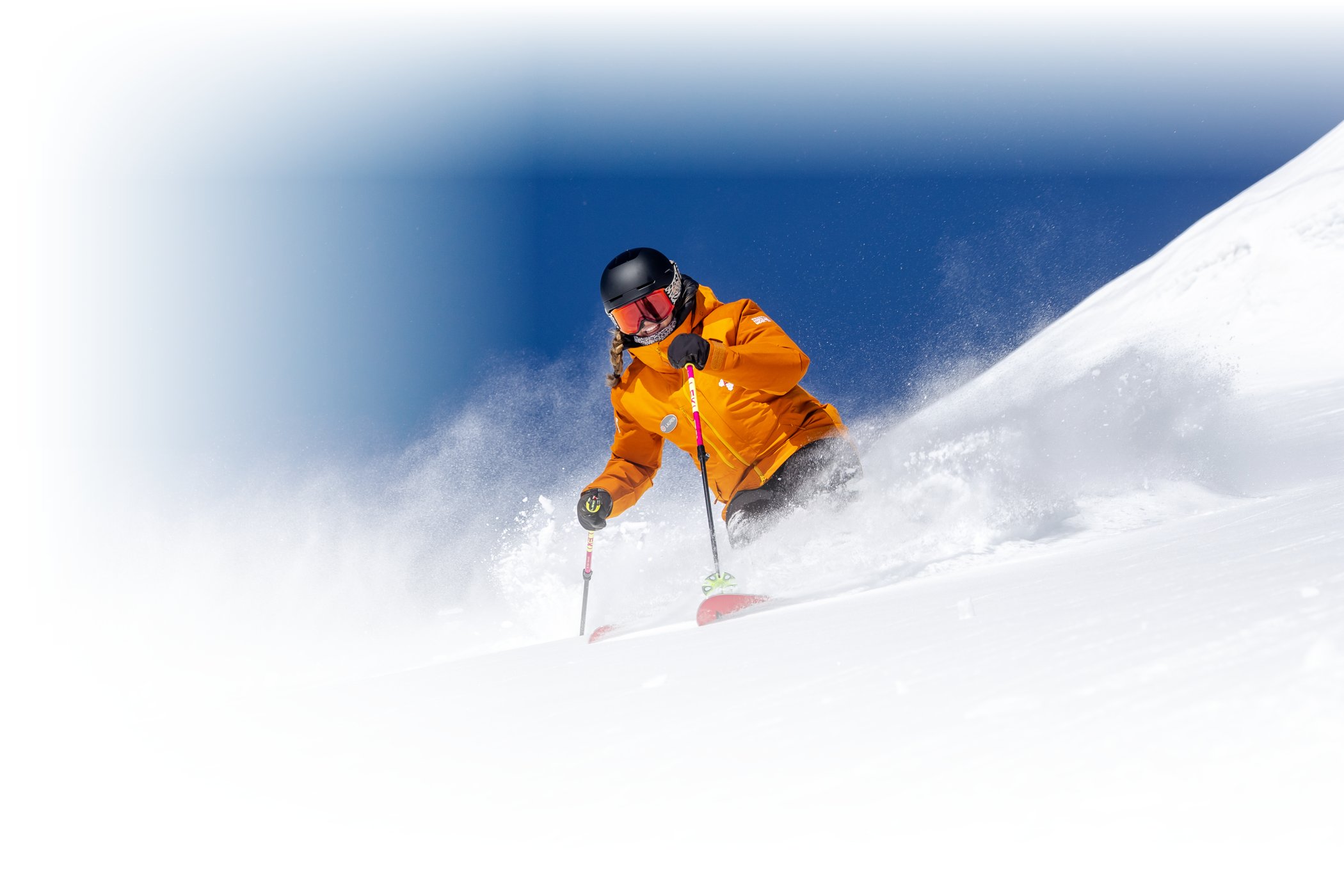 woman skier in deep steep powder