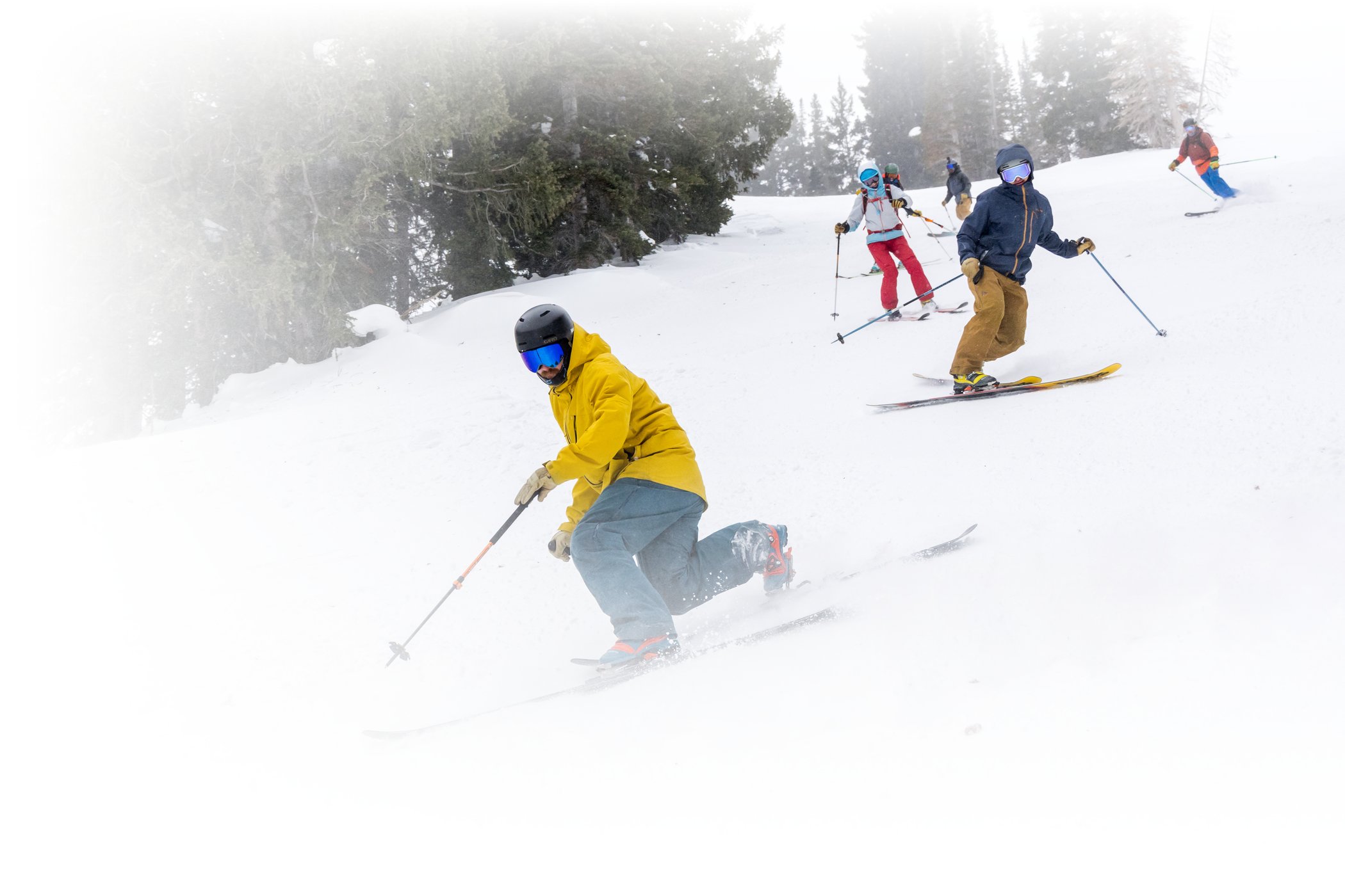Telemark skiers at Alta Ski Area on a snowy winter day