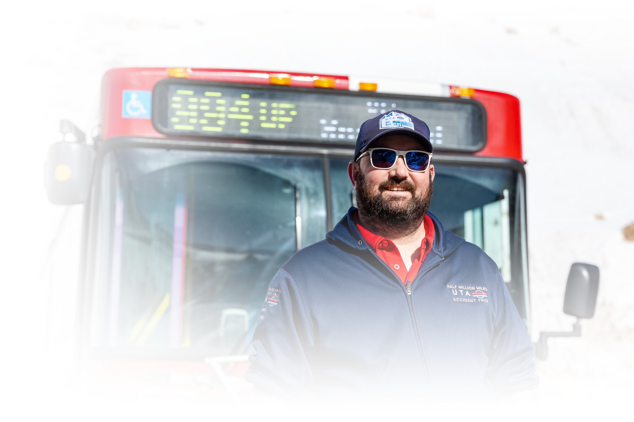 A UTA Bus Driver in front of the 994 bus