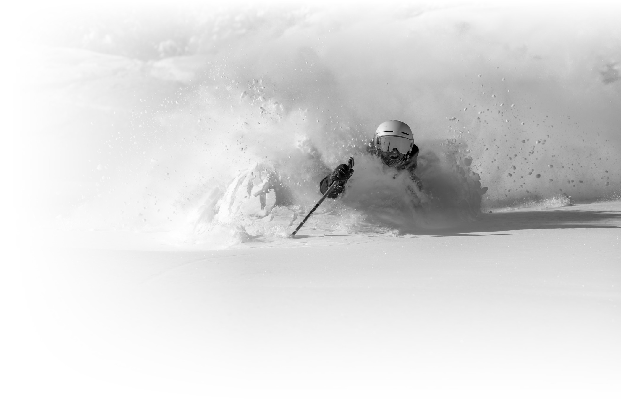A skier skis really deep powder