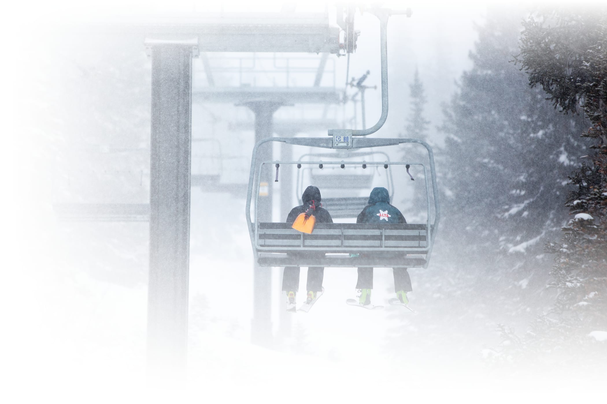 Alta employees ride lifts at Alta Ski Area