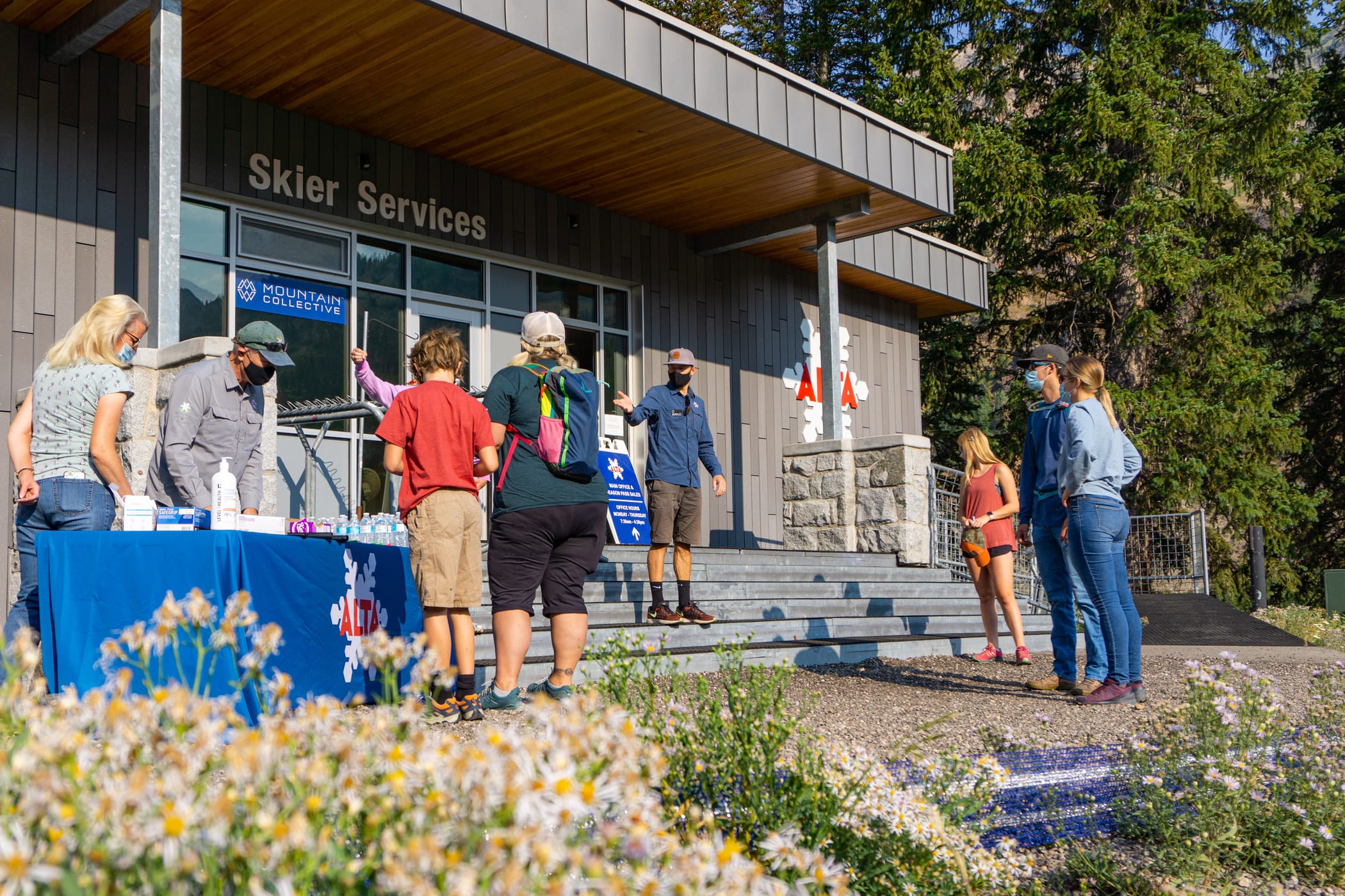 Mask-wearing volunteers arrive at Alta Ski Area
