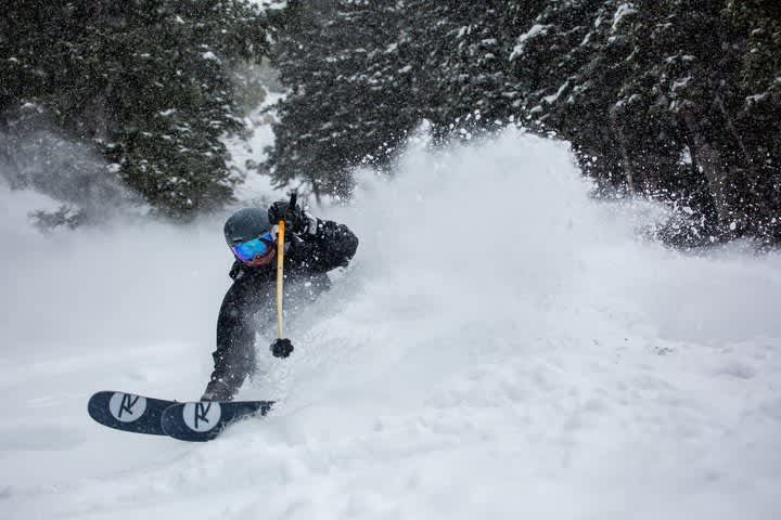 Brandon Ott slashes the first foot of new snow from the storm cycle.