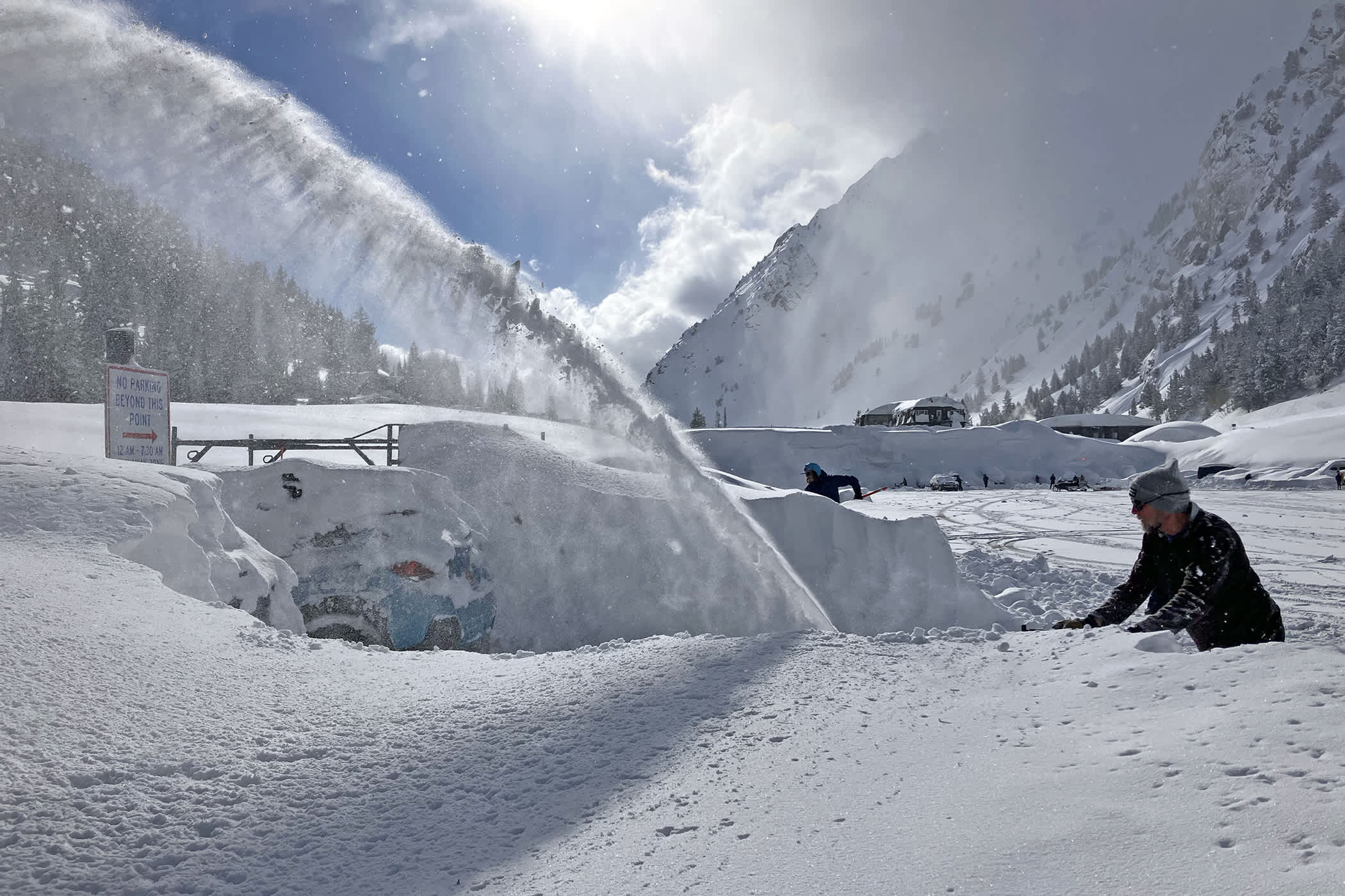 April 5th: Employees work to locate and extract their vehicles following a 66.5-inch storm | Photo: Emily Golitzin