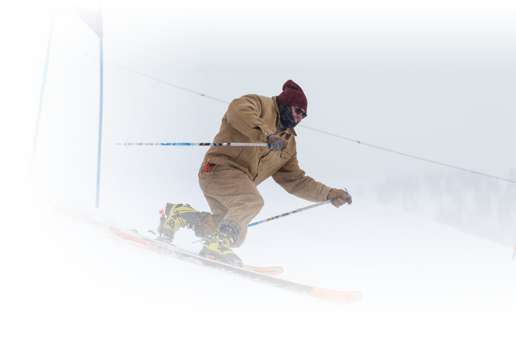 A skier in costume skis through a gate during the annual Groundhog Day Race at Alta Ski Area