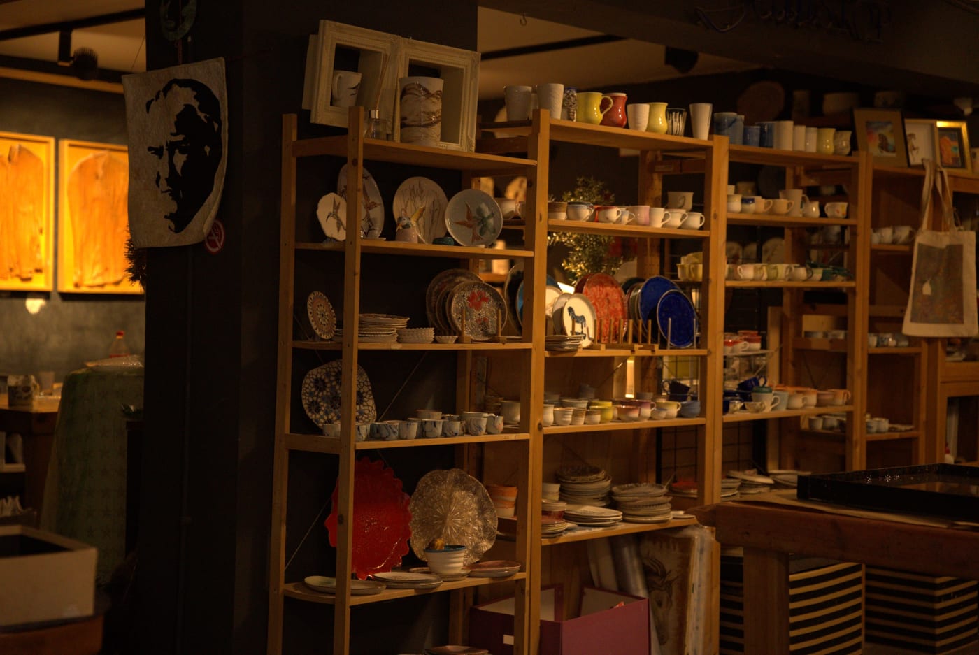 The Galata atelier with its shelves and lit marbled panels