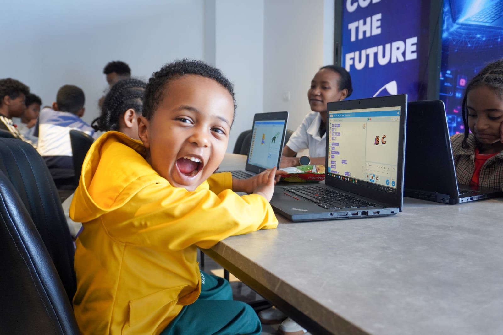 Student building a robot at STEM For Kids Ethiopia