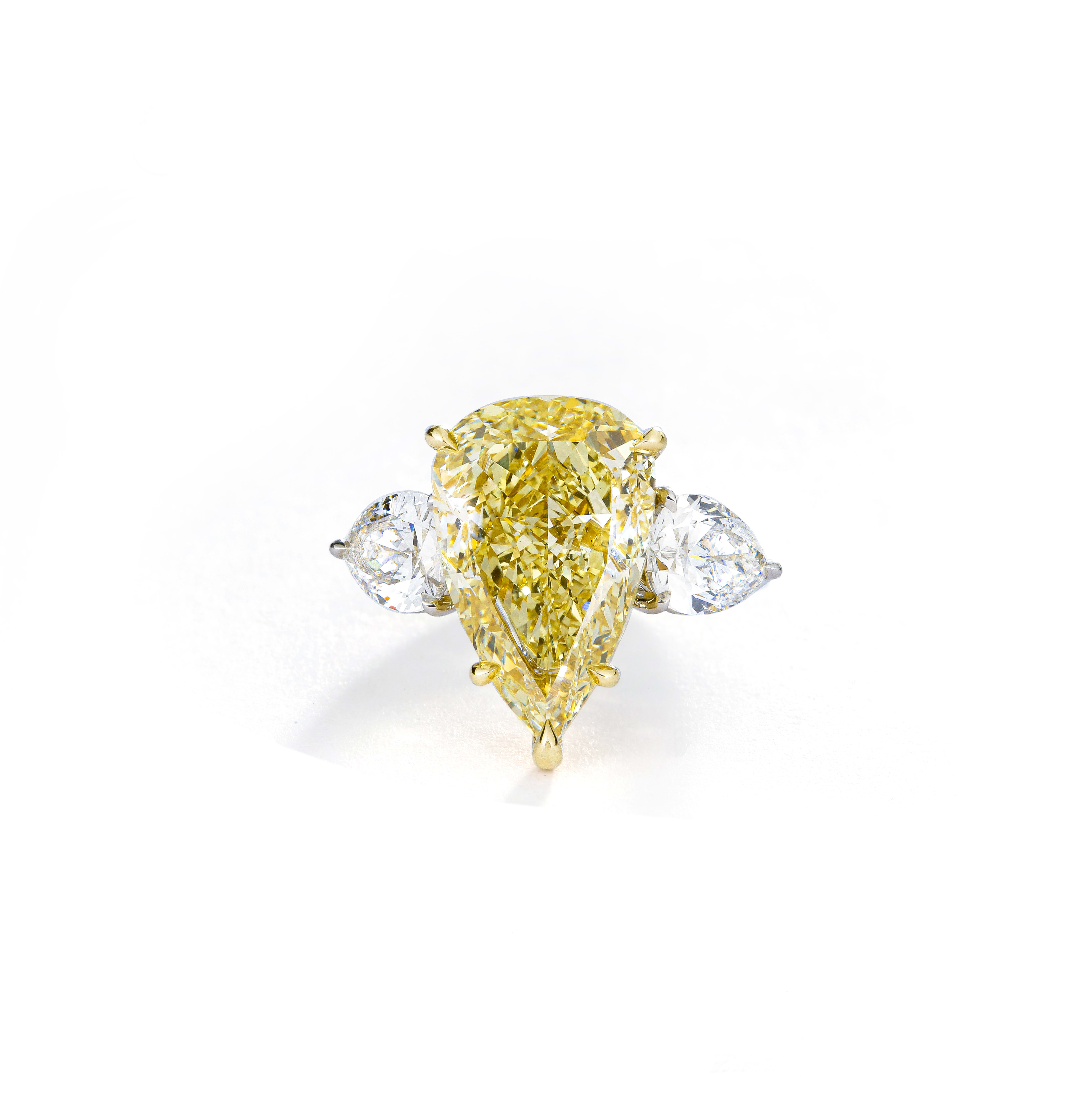 Fancy Yellow Pear Diamond Three Stone Engagement Ring