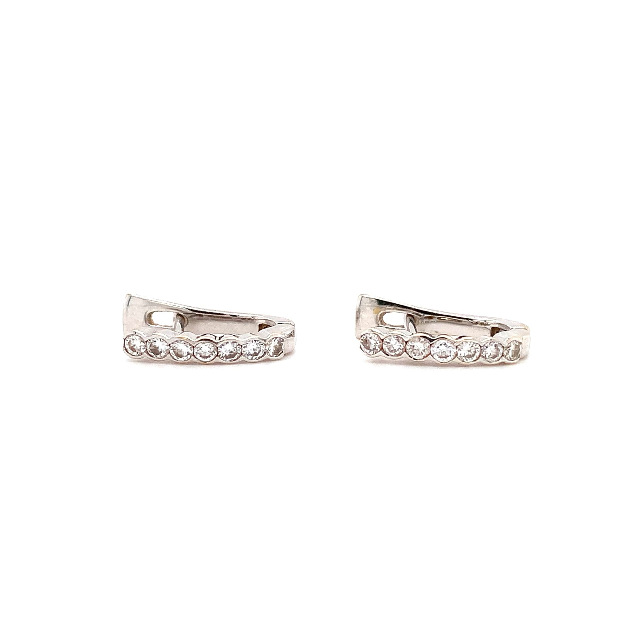 Diamond hoop huggie earrings 18k white gold