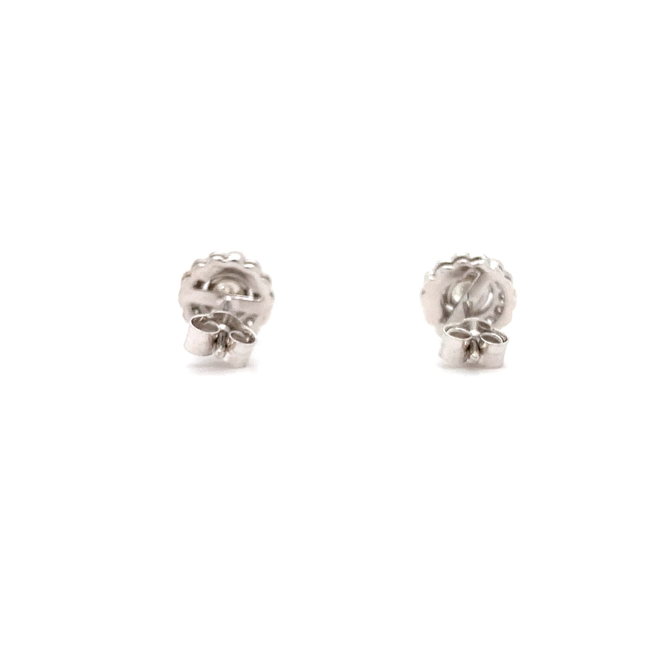 Diamond halo stud earrings 18k white gold