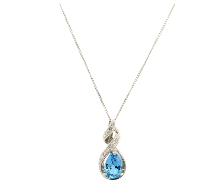 Diamond and topaz pendant necklace white gold