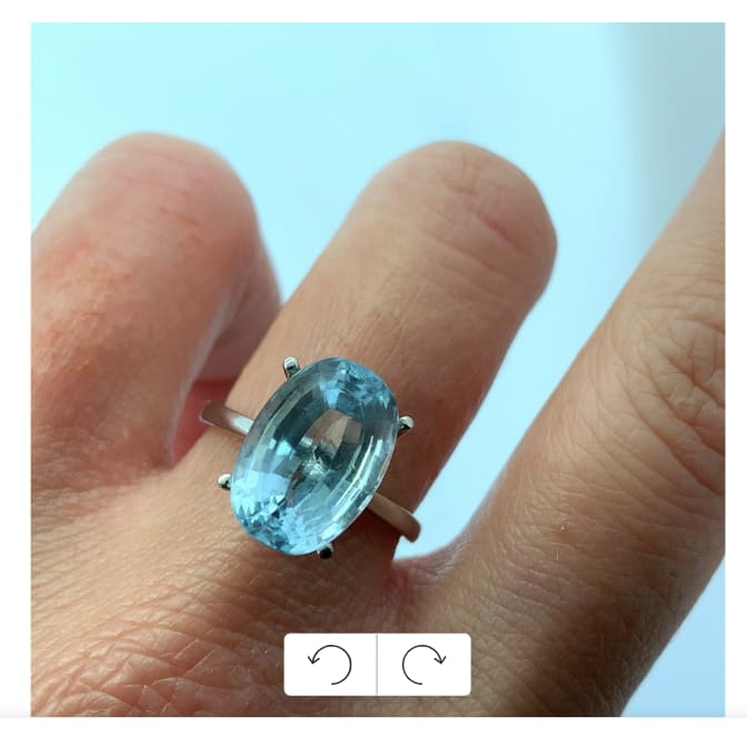 Blue aquamarine engagement ring blue sky colour set in 18k white gold solitaire