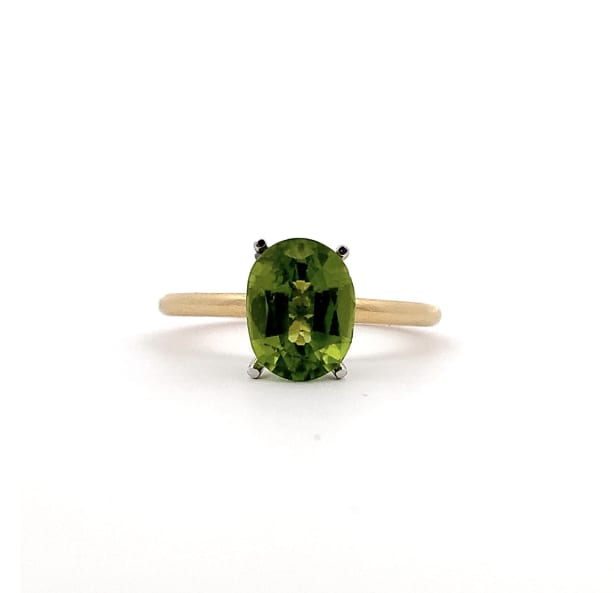 Peridot green oval cut solitaire engagement ring 18k white goold