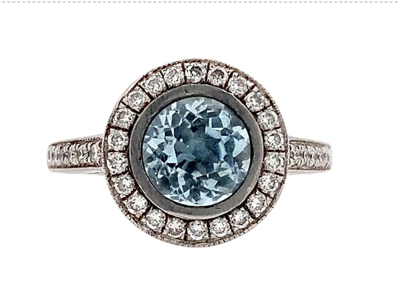 Aquamarine and diamond halo engagement ring 18k white gold