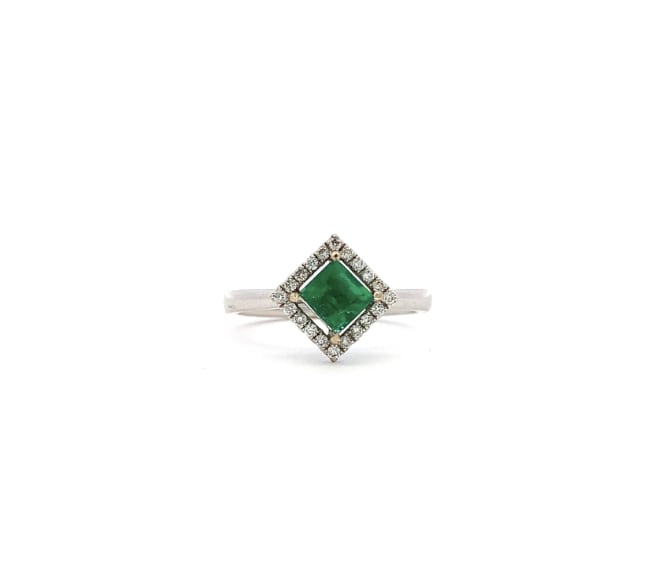 Discover the allure of this stunning Colombian green emerald and diamond halo ring, featuring a vibrant vivid green gemstone that captures the essence of elegance.