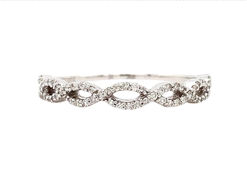 This beautiful 0.40ct diamond ring features an infinity twist design, making it perfect for weddings and engagements. The ring is made of 9ct white gold and has a white/colourless main stone. The round-shaped diamond is 0.40ct and is naturally created with excellent cut grade and F colour grade. The pave setting style adds a touch of elegance to the ring. Made in London. Accompanied by valuation. The band has a width of 2mm and comes in size L. The ring does not have any certification but is a product of Great Britain. The sparkle of the ring is flawless and the diamond clarity grade is VS1. This ring is perfect for anyone looking for a stylish and elegant engagement or wedding band.