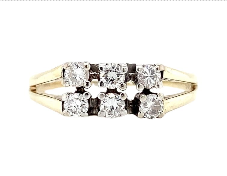 This exquisite 0.70ct diamond eternity engagement ring is a perfect choice for those who are looking for a timeless piece of jewellery.