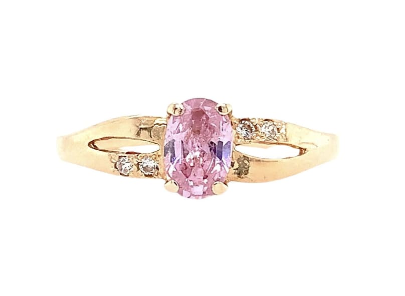Get ready to pop the question with this stunning pink morganite and diamond ring! This engagement ring features a beautiful solitaire setting with an oval-shaped pink morganite and white diamond that sparkles in the light.