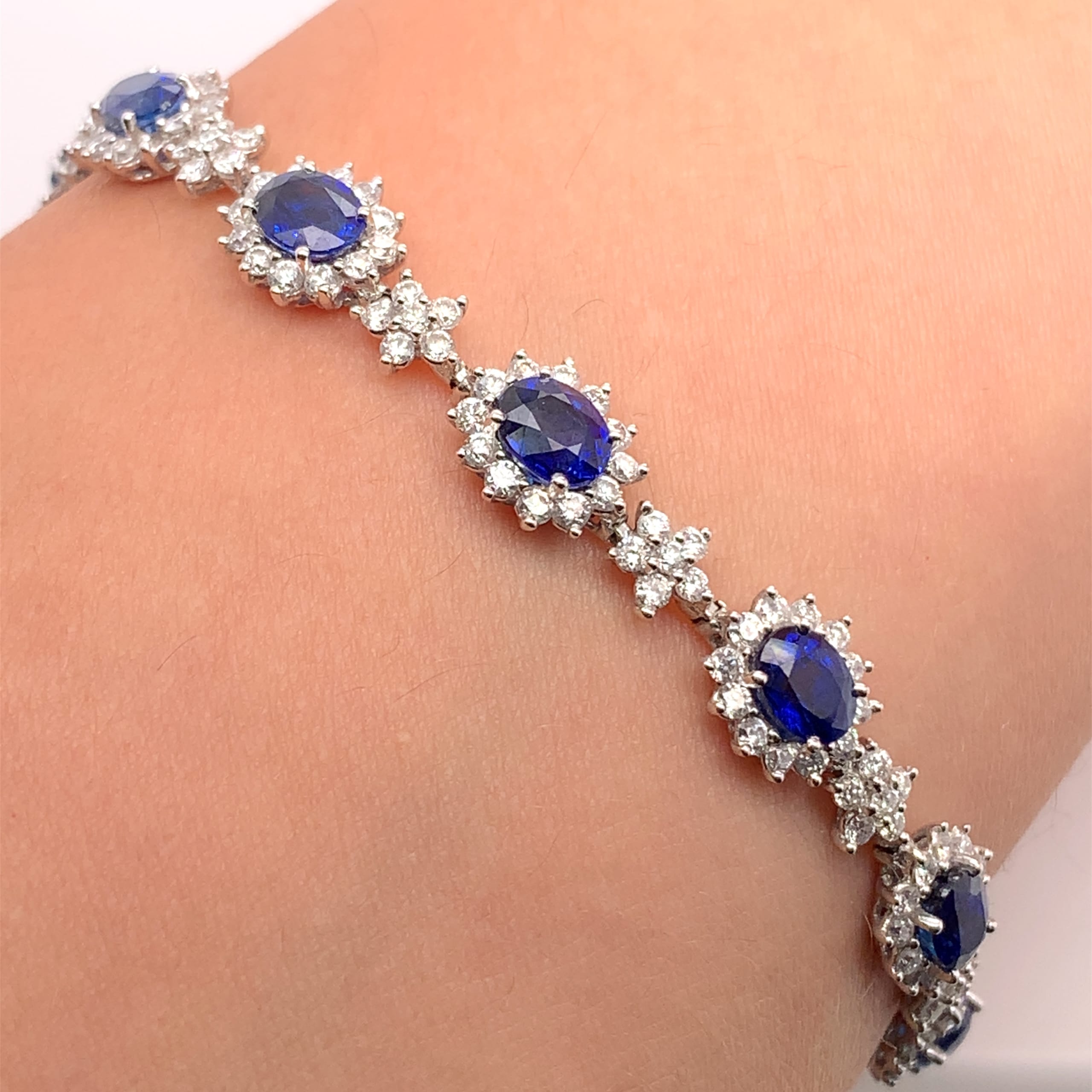 Sapphire and diamond halo tennis bracelet art deco 18k white gold